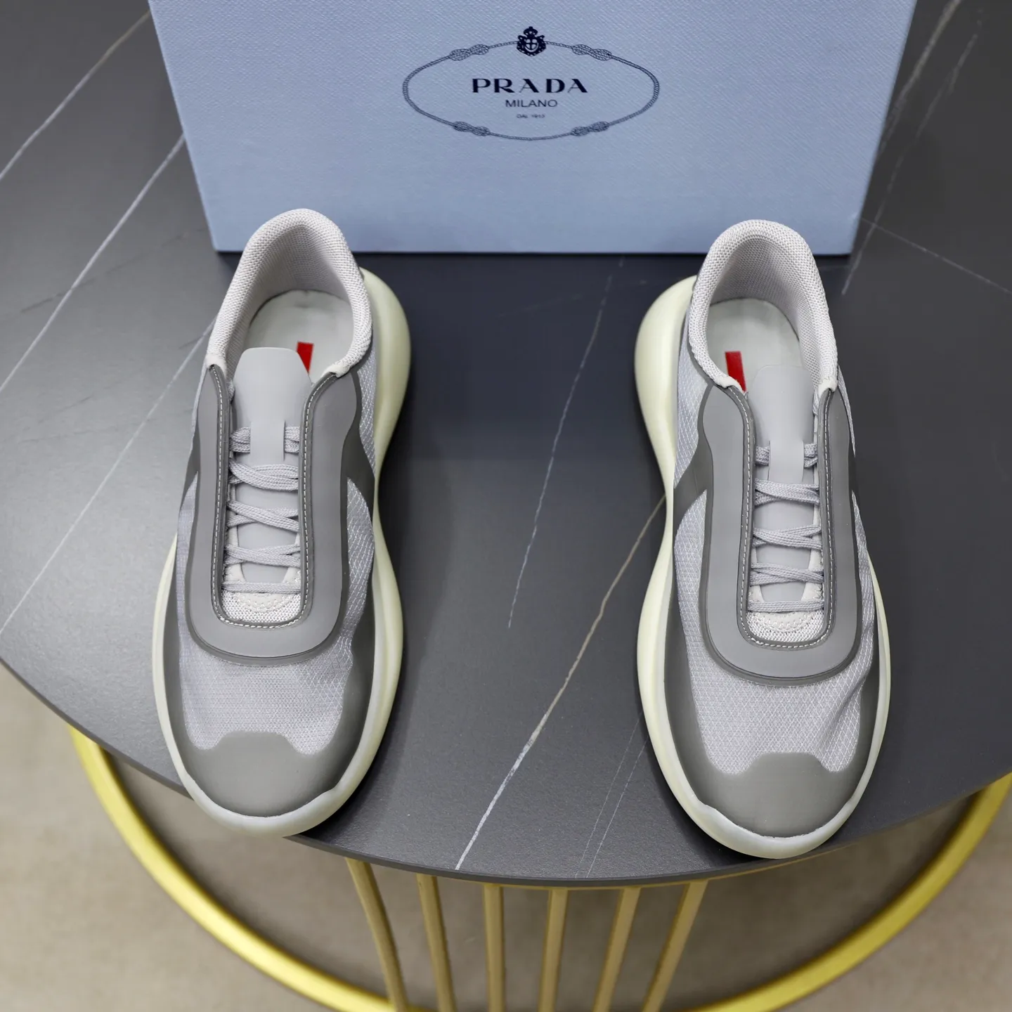 Men's Shoes 💰760💰 PRADA America's Cup Recycled Nylon and Bike Fabric Sneakers Practical and innovative, these regenerated nylon sneakers are modern, with lightweight soles and minimalist details. The upper is decorated with temperature-locking adhesive tape, screen-printed ADA logo, nylon loop shoelaces, T sole, made of ultra-light foam rubber filling material, rubber pattern texture, sole height: 40 mm, removable fabric-covered insole, Size 39-44